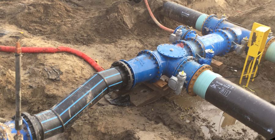 Aanleg drinkwaterleidingen in sleuf